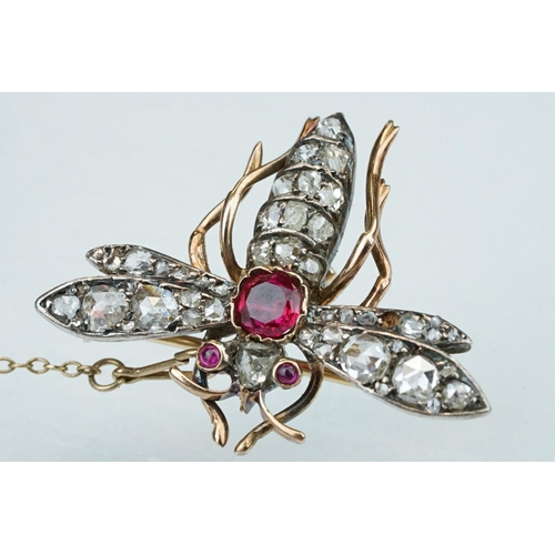 5 - 19th century ruby and diamond unmarked rose gold and silver brooch, the principal round mixed cut ru... 