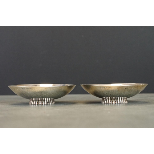 410 - Pair of silver footed trinket dishes, plain polished, stamped silver, diameter approx 10cm; together... 