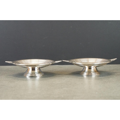 410 - Pair of silver footed trinket dishes, plain polished, stamped silver, diameter approx 10cm; together... 