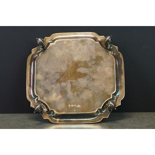 411 - Silver salver, octagonal form, plain polished, Chippendale border, raised on four scroll feet, maker... 