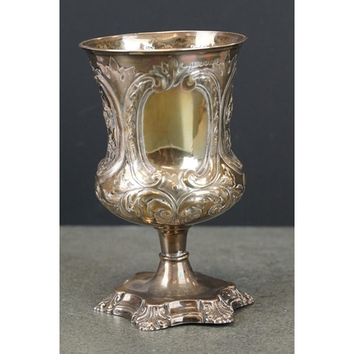 412 - Victorian silver chalice, repoussé and engraved floral and foliate scroll decoration, two blank cart... 