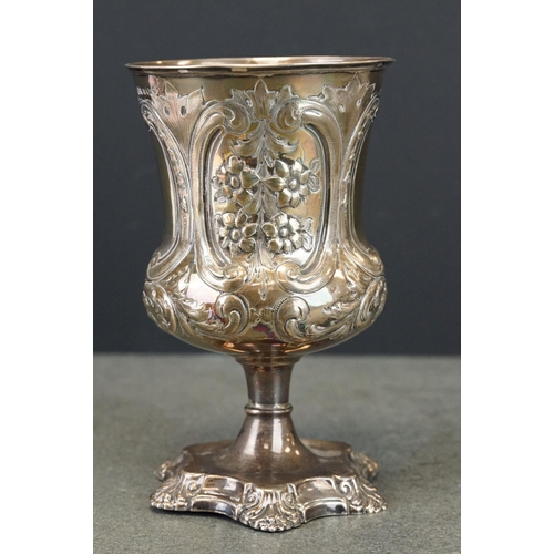 412 - Victorian silver chalice, repoussé and engraved floral and foliate scroll decoration, two blank cart... 