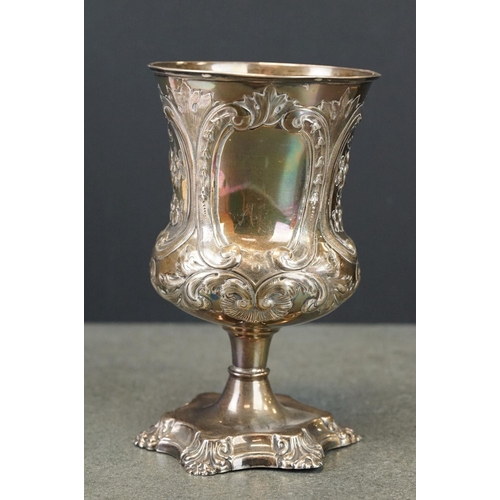 412 - Victorian silver chalice, repoussé and engraved floral and foliate scroll decoration, two blank cart... 