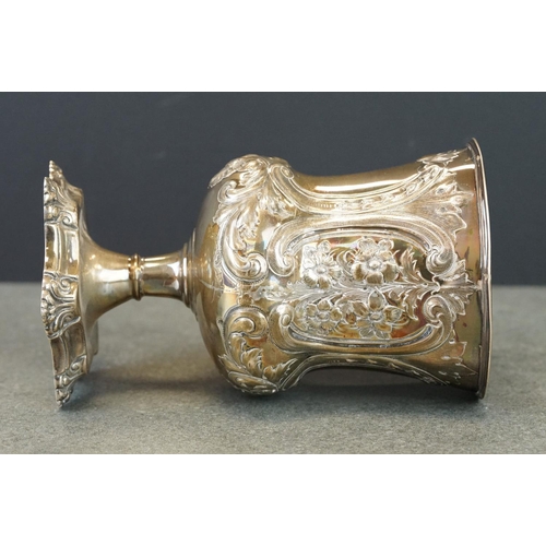 412 - Victorian silver chalice, repoussé and engraved floral and foliate scroll decoration, two blank cart... 