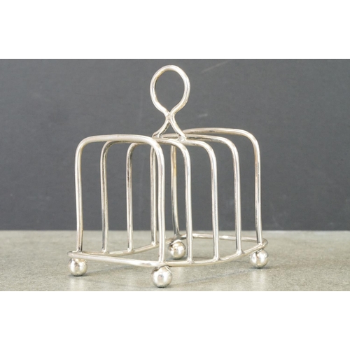 414 - Edwardian silver five bar toast rack, raised on four bun feet, makers TH Hazlewood & Co, Birmingham ... 