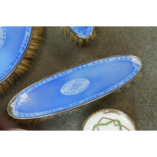 416 - Five piece enamelled silver dressing table brush set (enamel damaged), a silver backed oval clothes ... 