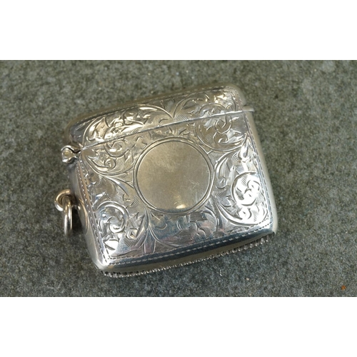 419 - Edwardian silver vesta case, engraved foliate scroll decoration, blank circular cartouche to centre,... 