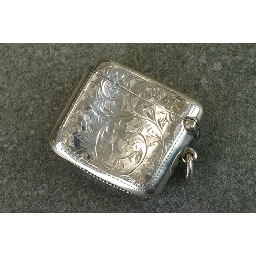 419 - Edwardian silver vesta case, engraved foliate scroll decoration, blank circular cartouche to centre,... 