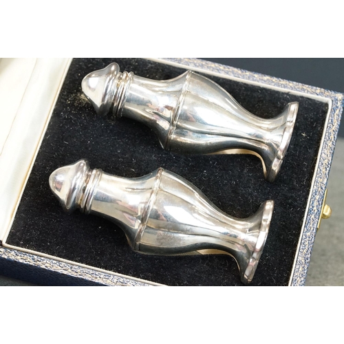 425 - Pair of silver cruets, baluster form raised on scalloped foot, makers S J Rose & Son, London 1970, h... 