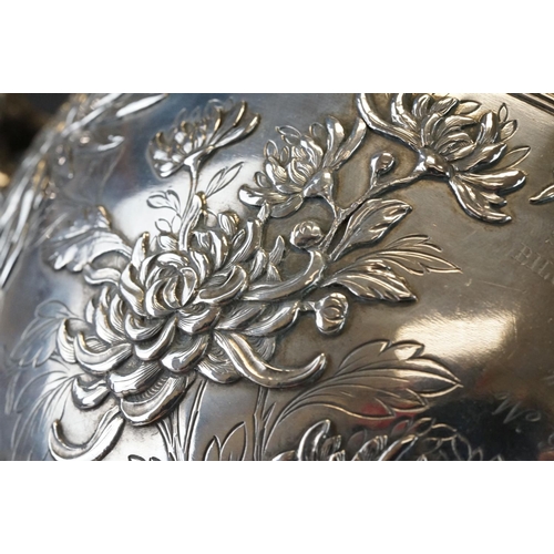 427 - White metal twin handled bowl raised on four feet, the handles modelled as branches, the bowl with c... 