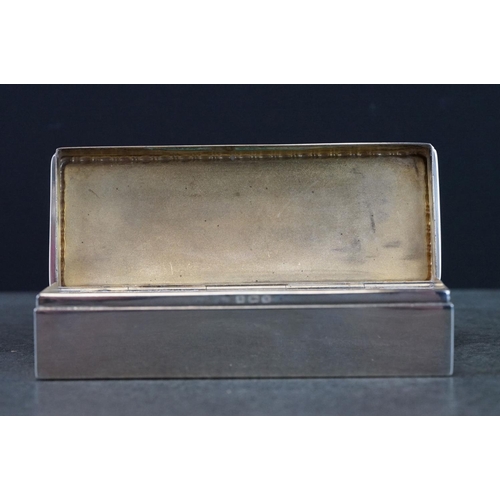 430 - Silver trinket box, repoussé border to the hinged lid, plain polished body, gilt interior, makers Le... 