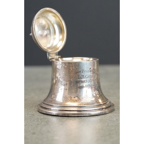 437 - Silver bell-shaped inkwell, weighted base, missing liner; together with a silver trinket dish, repou... 