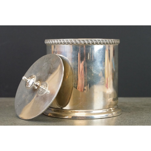 444 - Edwardian silver tea caddy, plain polished cylindrical form, gadroon decoration to the border, lidde... 