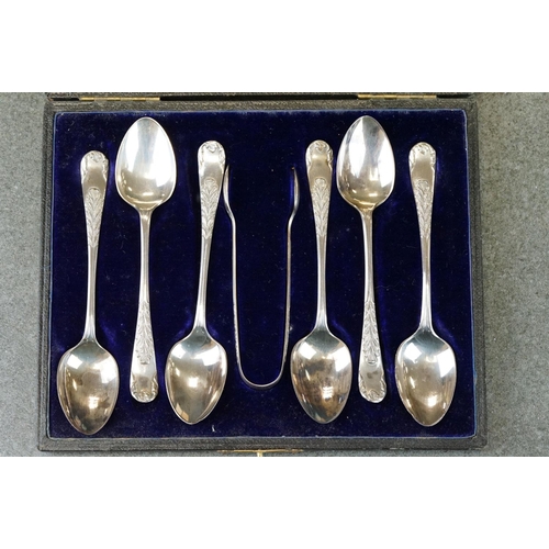 456 - Cased set of six Edwardian silver coffee spoons with matching sugar tongs, cast foliate decoration i... 