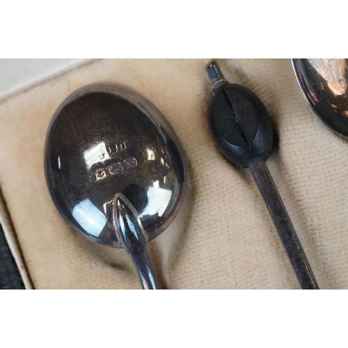 456 - Cased set of six Edwardian silver coffee spoons with matching sugar tongs, cast foliate decoration i... 