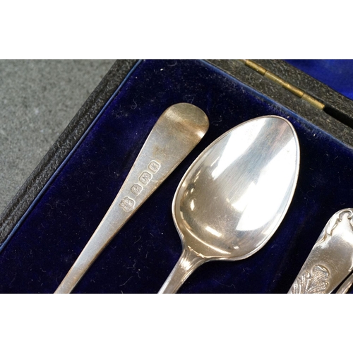 456 - Cased set of six Edwardian silver coffee spoons with matching sugar tongs, cast foliate decoration i... 