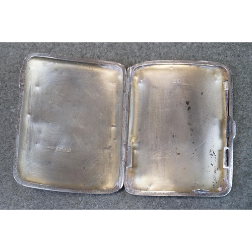 458 - Group of silver items to include a George V silver cigarette case, early 20th century silver peppere... 