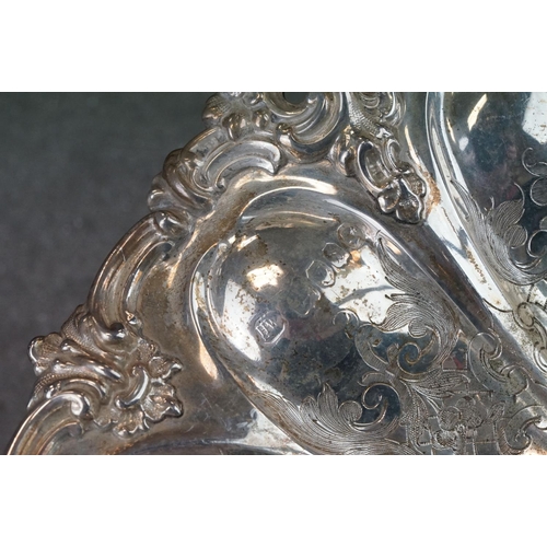 460 - Silver swing handled pedestal bowl, cast foliate scroll border, repoussé tapered panels with engrave... 