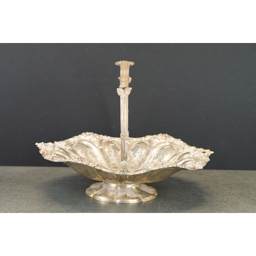 460 - Silver swing handled pedestal bowl, cast foliate scroll border, repoussé tapered panels with engrave... 