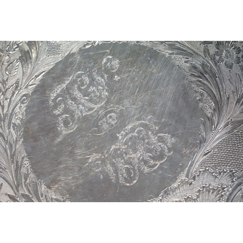 462 - George IV William Bateman II silver salver raised on three cast floral and foliate feet, the border ... 