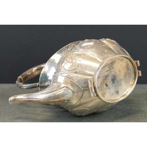 465 - Edwardian silver spirit kettle, the teapot with repoussé floral and foliate decoration throughout, h... 