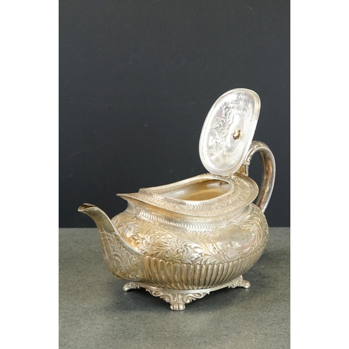 467 - Edwardian matched four piece silver tea service comprising teapot, hot water pot, milk jug and twin ... 