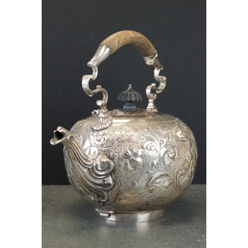 469 - Spirit kettle, repoussé foliate scroll decoration to the melon shaped body, scroll handle, wooden ha... 