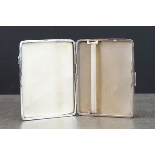 478 - Silver cigarette case, engine turned decoration, initialled rectangular cartouche, gilt lined interi... 