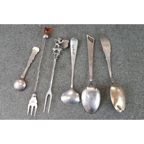 482 - Collection of silver souvenir teaspoons and pickle forks from around the world, to include paste and... 