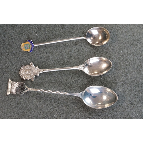 482 - Collection of silver souvenir teaspoons and pickle forks from around the world, to include paste and... 