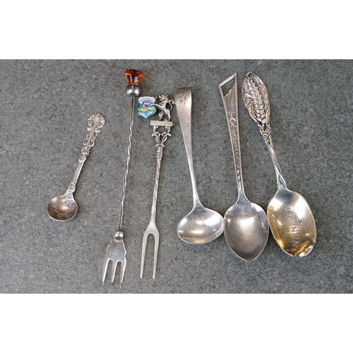 482 - Collection of silver souvenir teaspoons and pickle forks from around the world, to include paste and... 