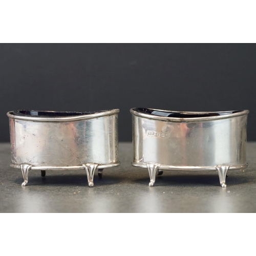 488 - Pair of oval navette form open silver salt cellars raised on four tapered feet, makers Robert Pringl... 