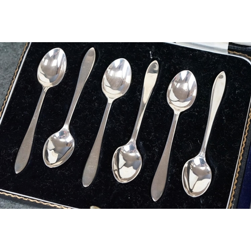 498 - Cased set of six George VI silver demitasse spoons of plain polished form, Sheffield 1938, length ap... 