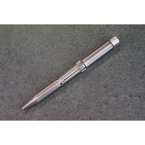 501 - Silver pencil with 4 retractable nibs and engine turned decoration, by JM & Co, London 1938, approx ... 