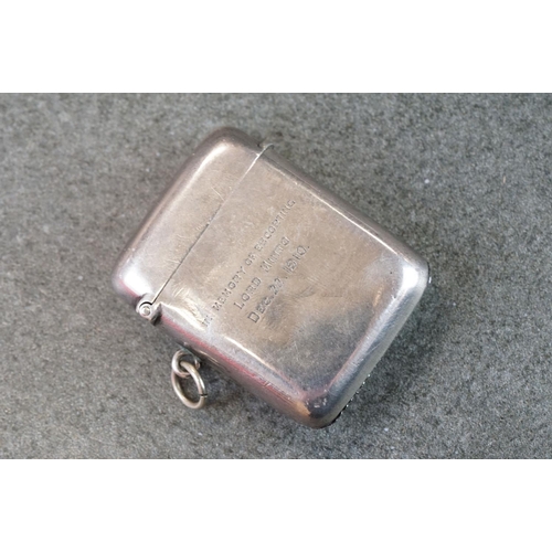 504 - Group of silver items to include three silver vesta cases, a silver propelling cuticle tool and a si... 