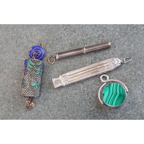 504 - Group of silver items to include three silver vesta cases, a silver propelling cuticle tool and a si... 