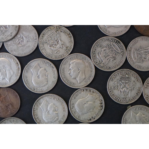 143 - A Collection of mainly British pre decimal coins to include silver examples together with a quantity... 