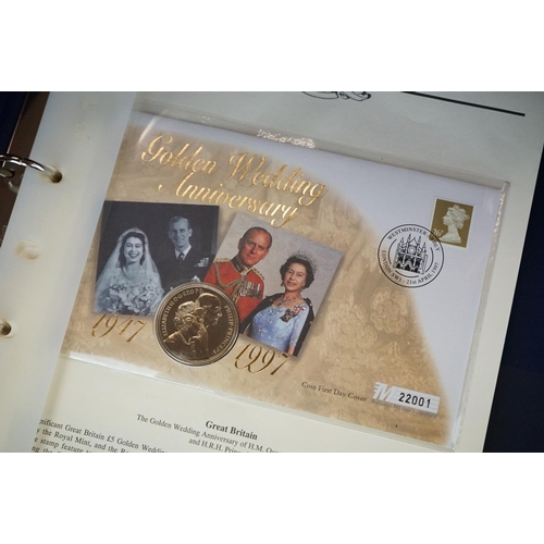 180 - A Westminster Mint 'The Royal Family' Coin & stamp cover collection contained within six albums.