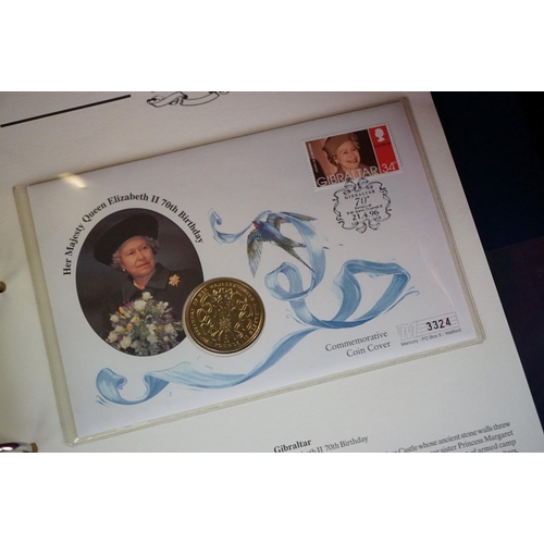 180 - A Westminster Mint 'The Royal Family' Coin & stamp cover collection contained within six albums.