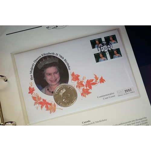 180 - A Westminster Mint 'The Royal Family' Coin & stamp cover collection contained within six albums.