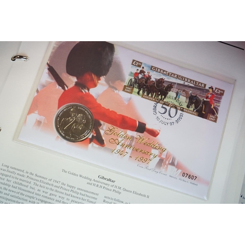 180 - A Westminster Mint 'The Royal Family' Coin & stamp cover collection contained within six albums.