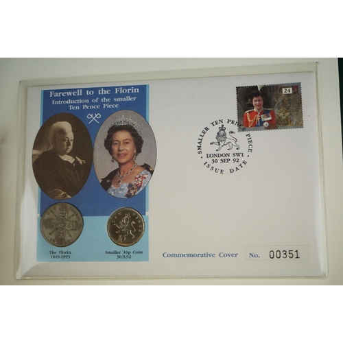 181 - A collection of Westminster Mint limited edition coin and stamp covers to include Crowns, £5 coin, £... 