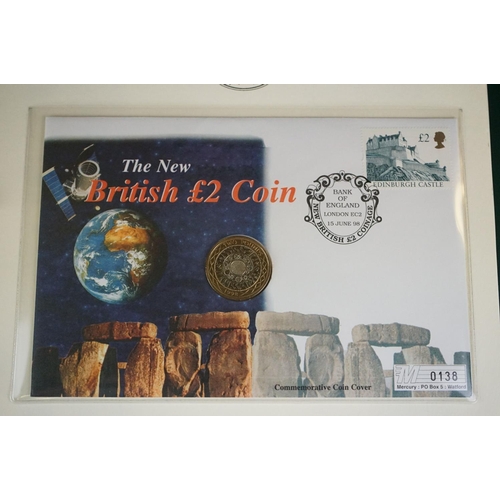 182 - A collection of Westminster Mint limited edition coin and stamp covers contained within three coin &... 