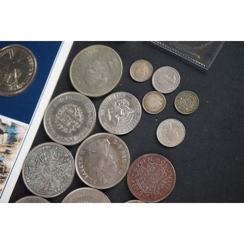 150 - A small collection of mainly British pre decimal and commemorative coins to include silver examples.