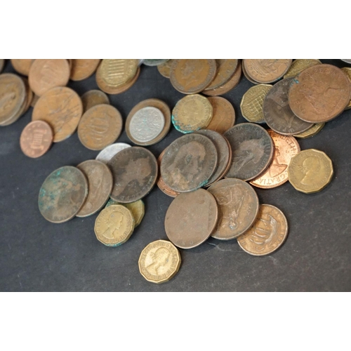 154 - A small collection of mainly British pre decimal coins to include Victorian and silver examples.