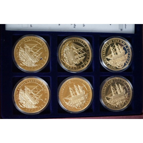 156 - A 250 years HMS Victory anniversary six coin commemorative set together with a British banknotes six... 