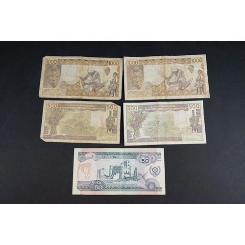 58 - A collection of approx forty banknotes, mainly from African nations.