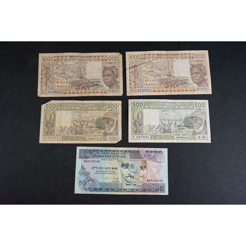 58 - A collection of approx forty banknotes, mainly from African nations.