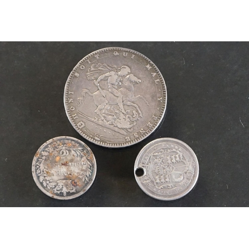 22 - A British King George III silver full crown coin dated 1820 together with two King George III silver... 