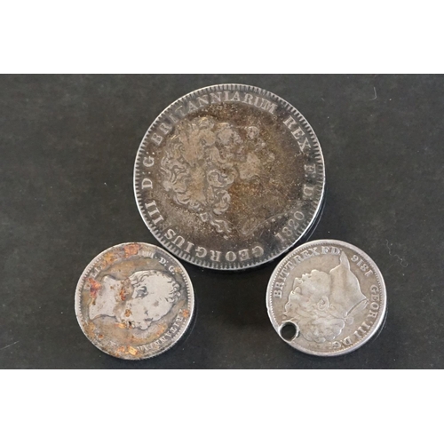 22 - A British King George III silver full crown coin dated 1820 together with two King George III silver... 